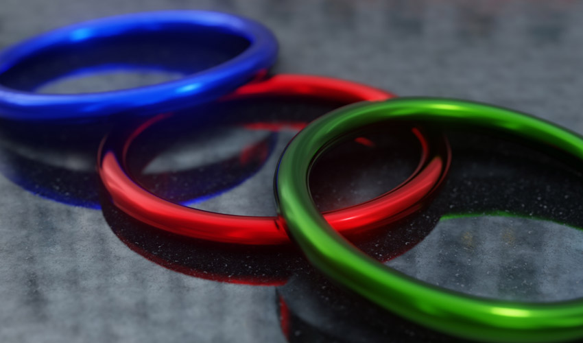 Metallic red, green, and blue rings.